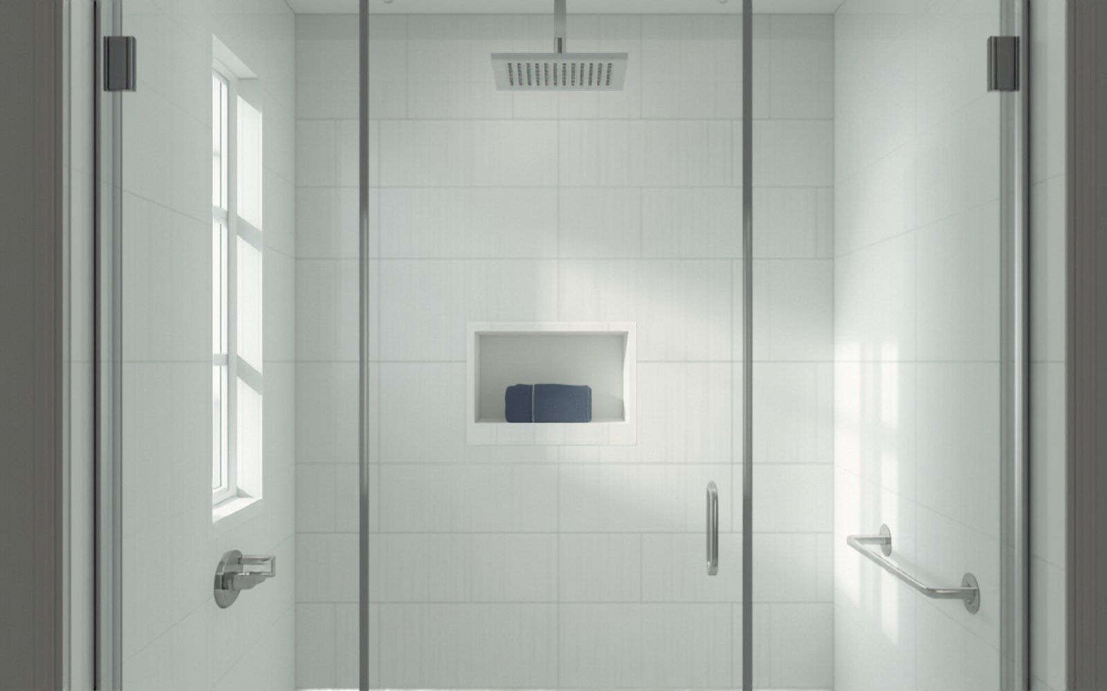 Walk-in shower with large-format white tile, glass panel, rainfall head, niche shelf