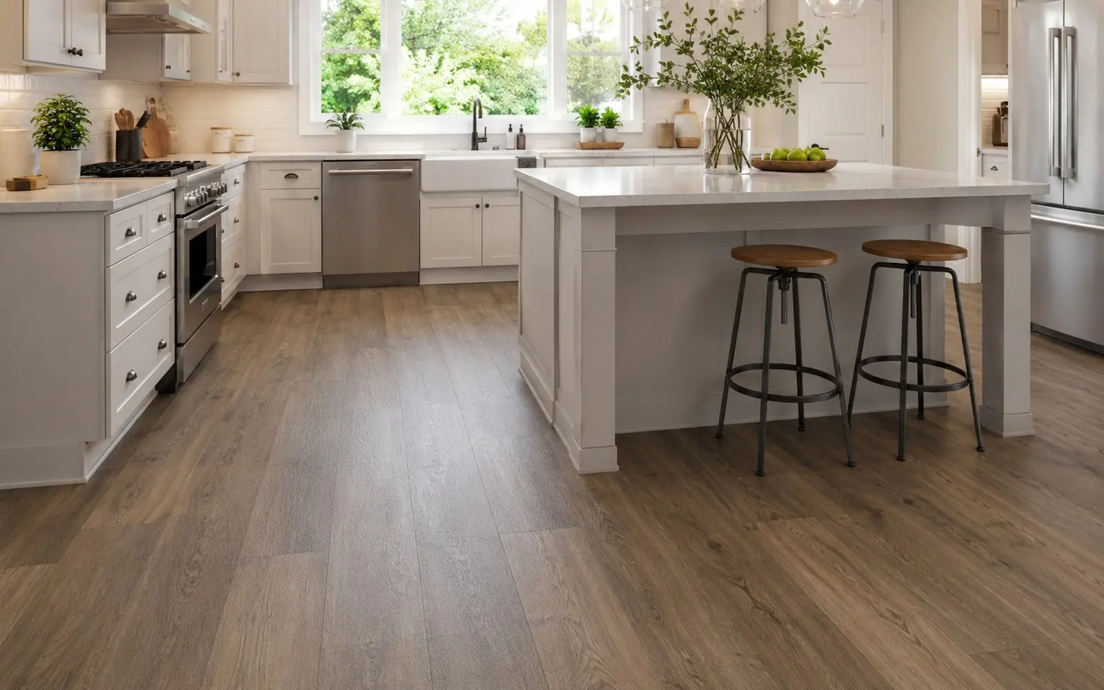 Luxury vinyl plank floor in a finished kitchen, wood-look texture in daylight