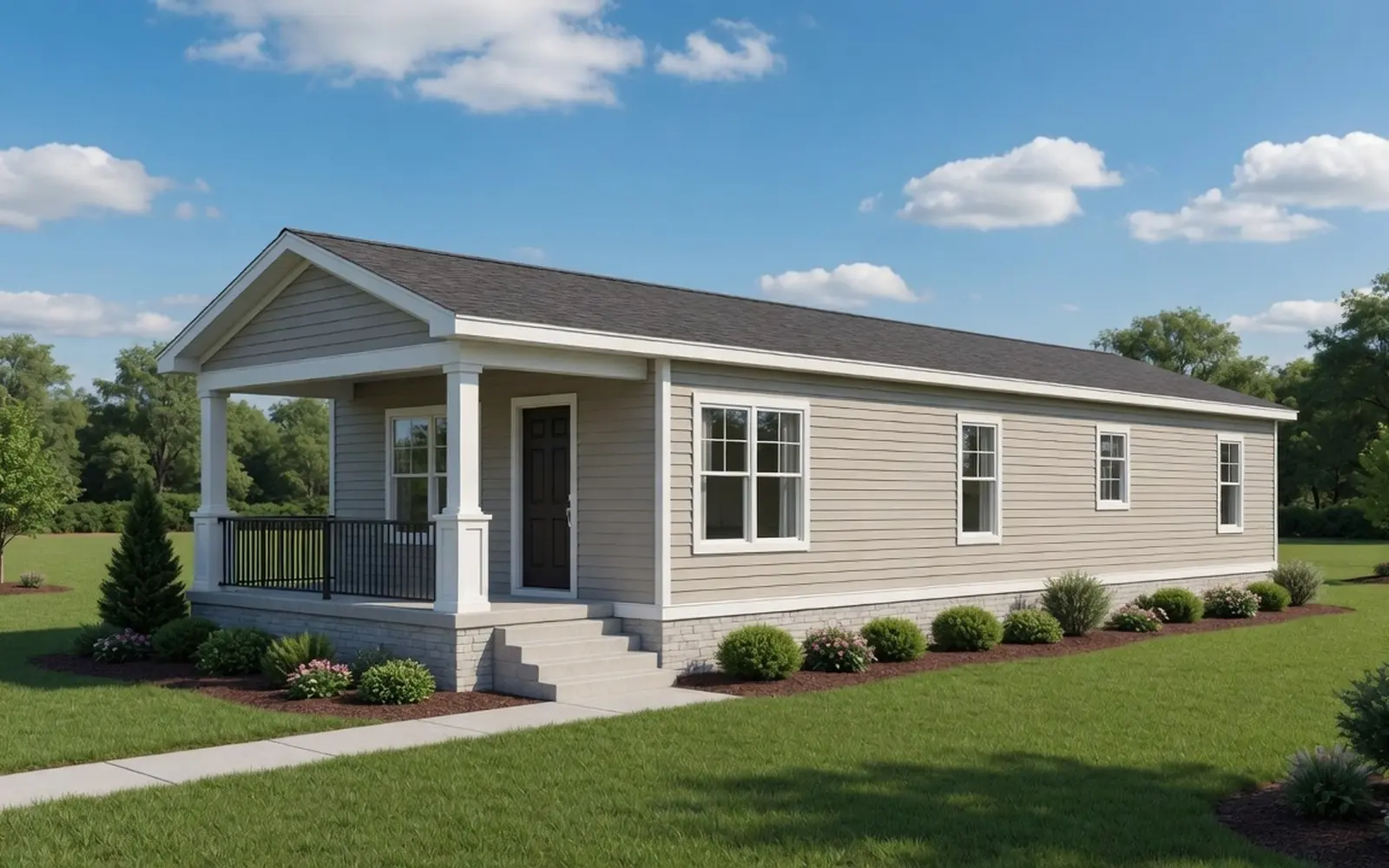 Well-kept modern manufactured home with skirting and small porch, sunny lot